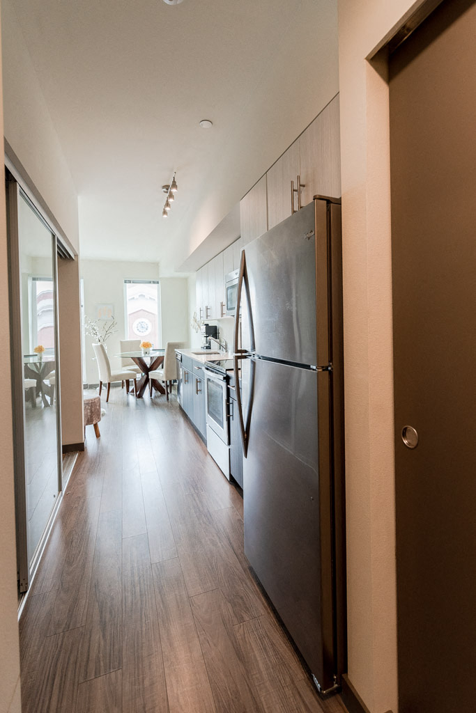 Seattle Apartments - Icon Apartments - Entryway, Kitchen, and Dining Room at Icon Apartments, Seattle, WA, 98104